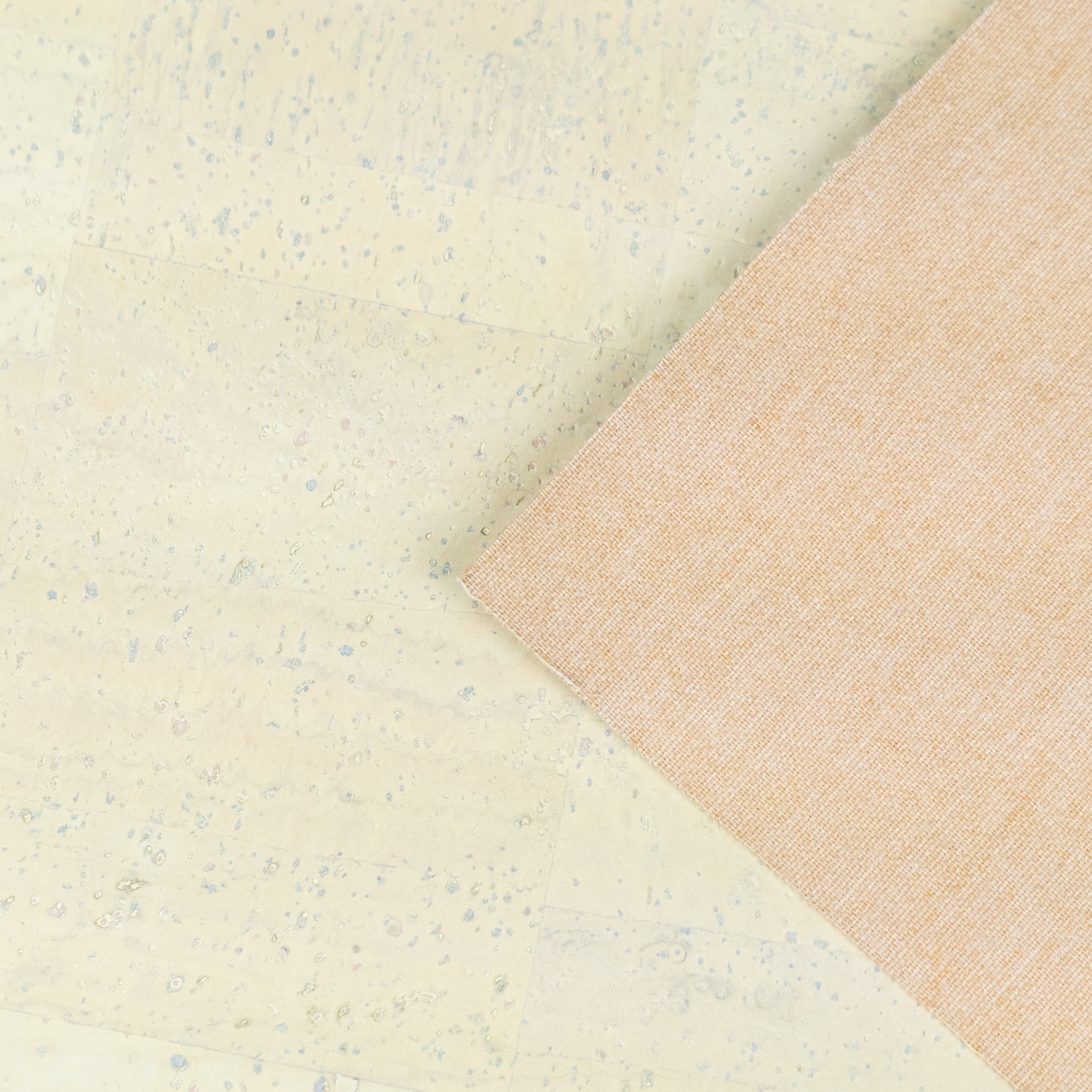 Soft cream natural cork fabric with subtle colorful speckles  COF-680